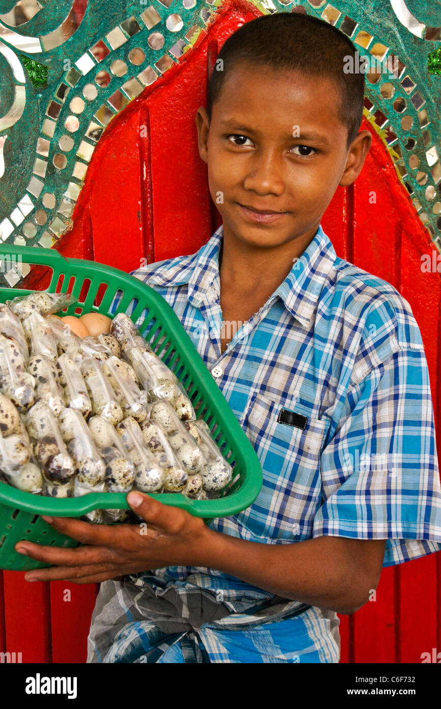 Boy selling eggs, Bago (Pegu), Myanmar (Burma) Stock Photo