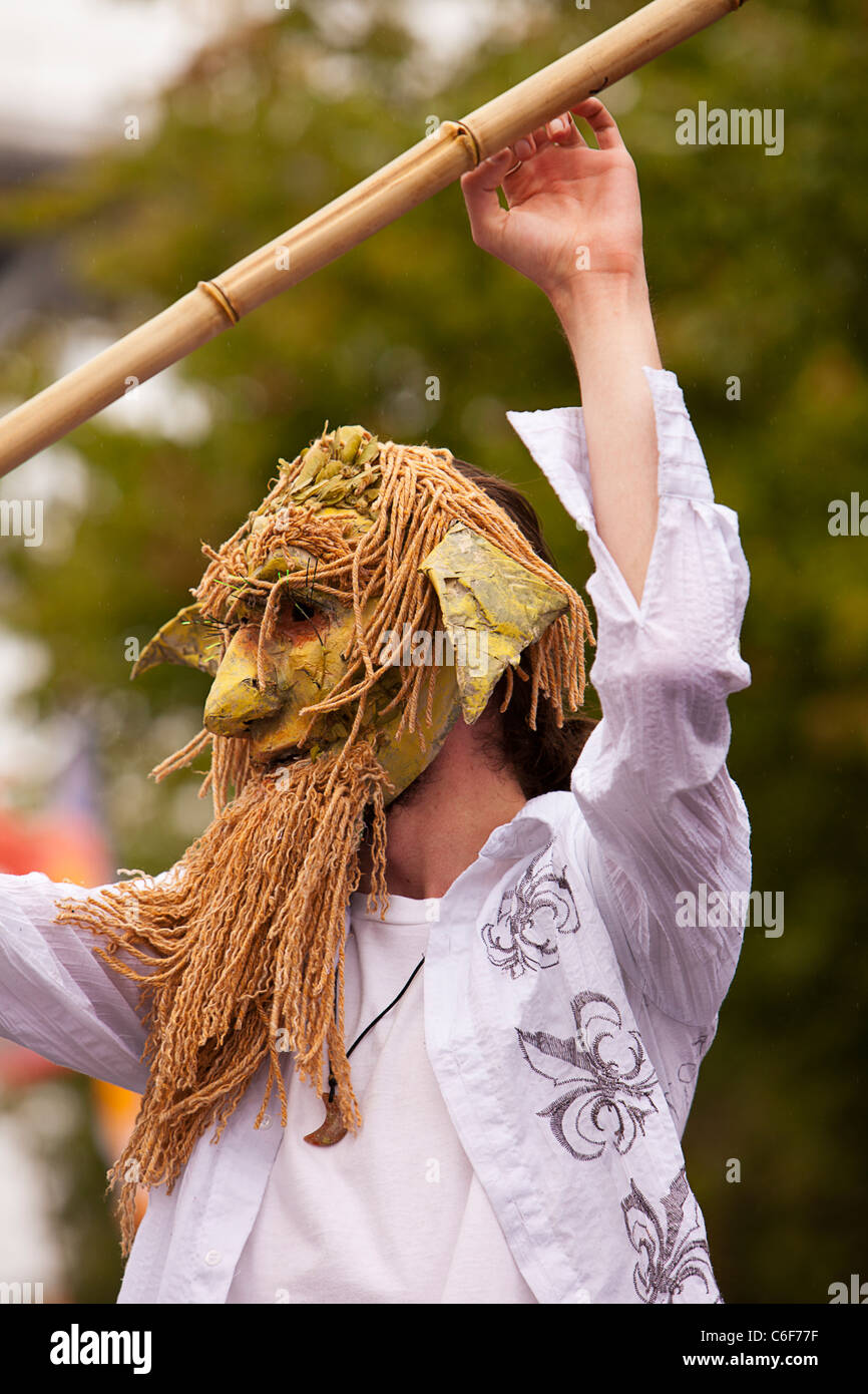 Man In Mask Performing In The Summer Solstice Parade Stock Photo