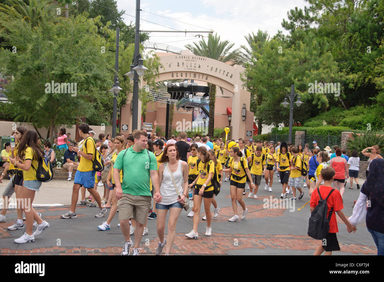 rock 'n' roller coaster entrance with a teenage tour group leaving the ride in disneys hollywood studios orlando florida Stock Photo