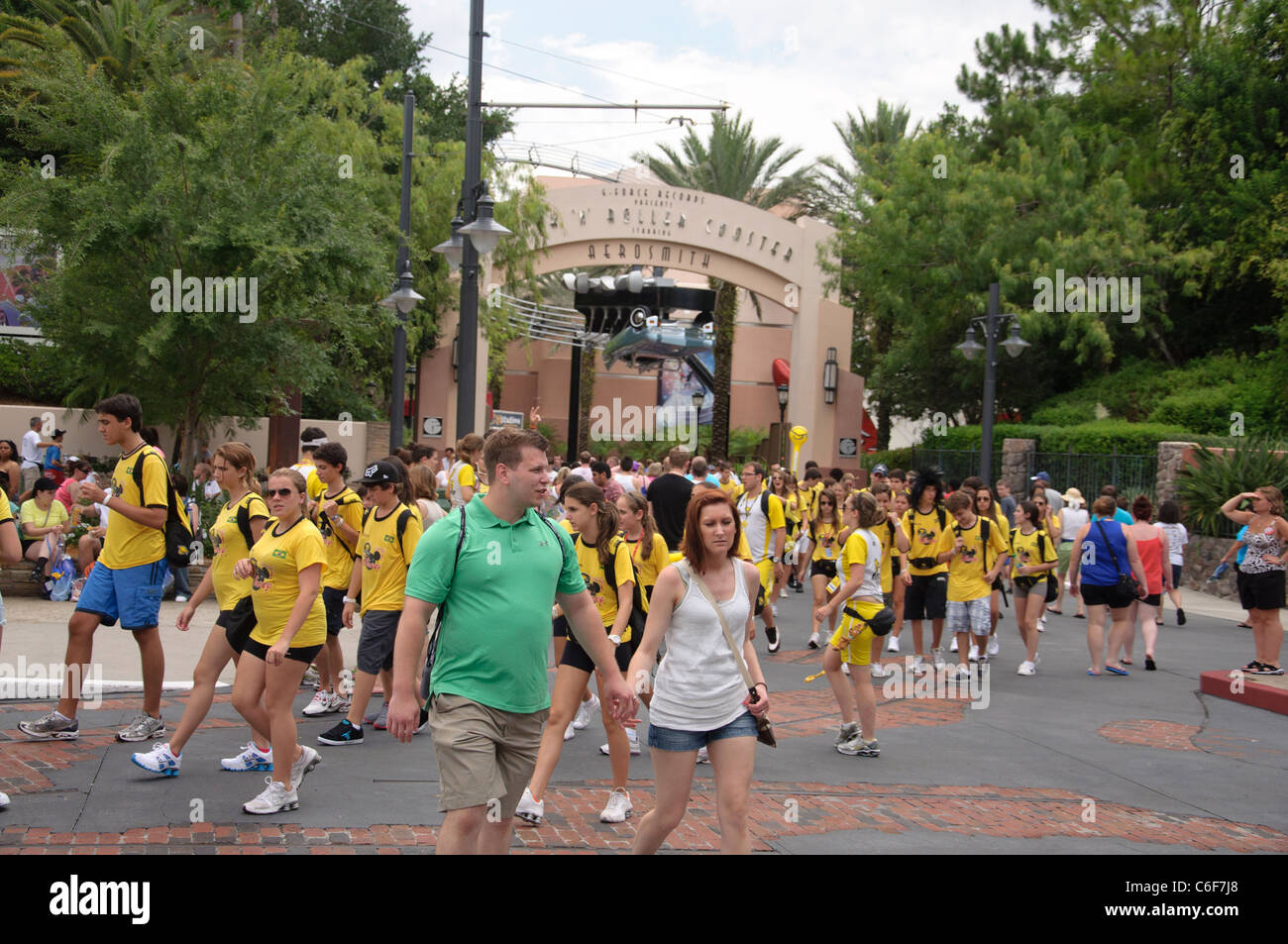 rock 'n' roller coaster entrance with a teenage tour group leaving the ride in disneys hollywood studios orlando florida Stock Photo