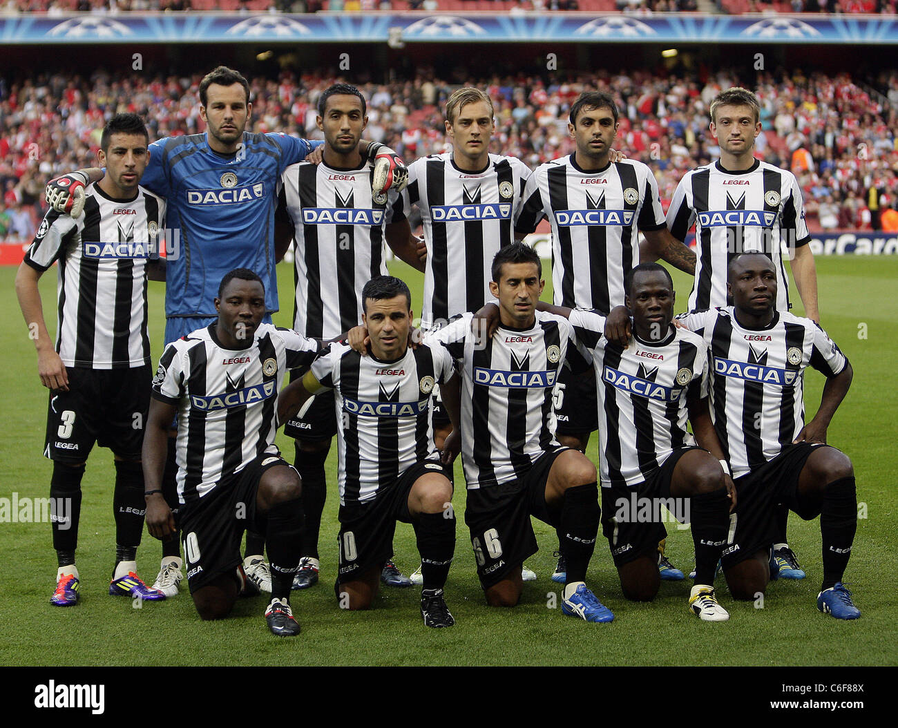 Udinese team group line-up before the the UEFA Champions League Play-off 1st leg match between Arsenal 1-0 Udinese Calcio. Stock Photo