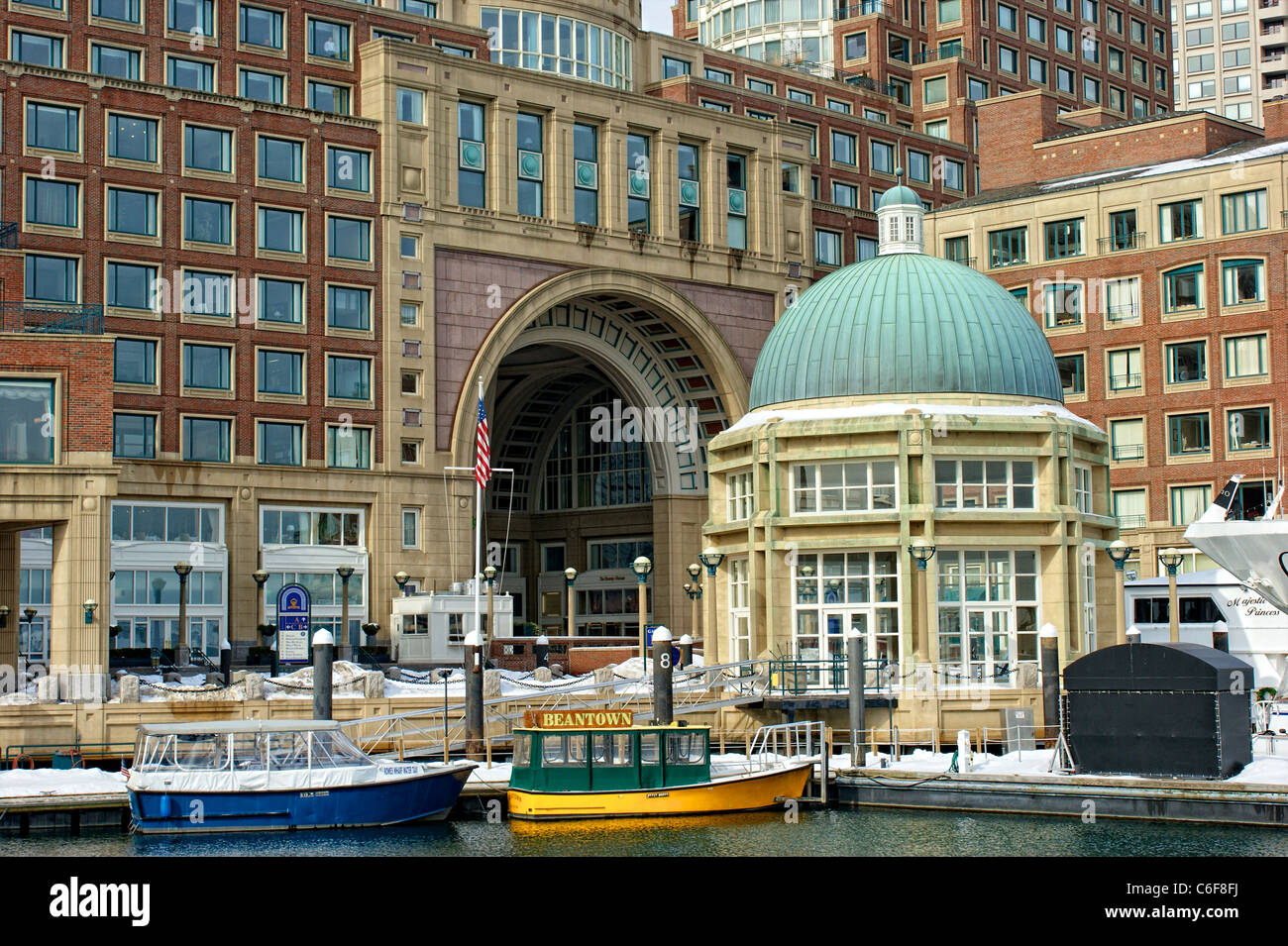 View of the arched entrance to Historic Rowe's Wharf from inside the ...