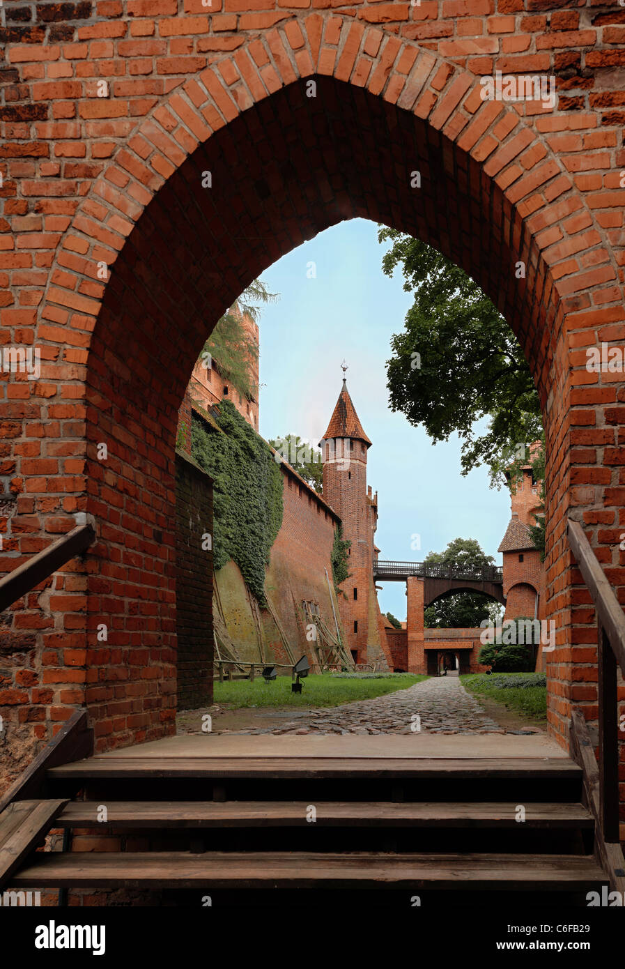 View of the Teutonic Order’s castle in Malbork, inner court. Stitched mosaic panorama in high resolution. Stock Photo