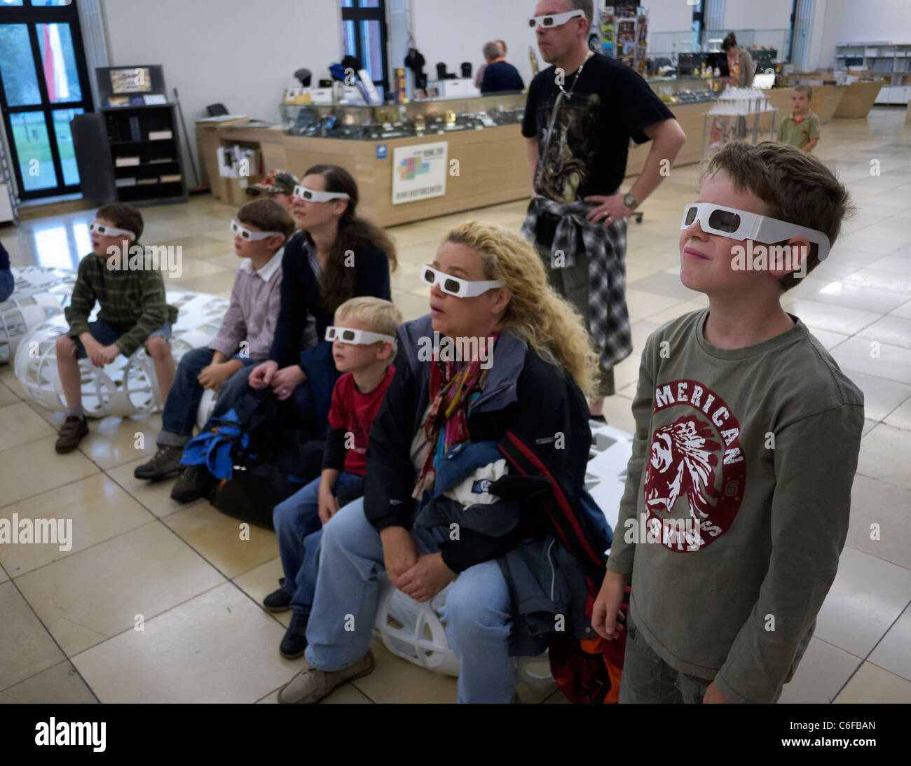 Visitors watch 3D film with 3D glasses at the Deutsches Bergbau-Museum or German Mining Museum in Bochum Germany Stock Photo