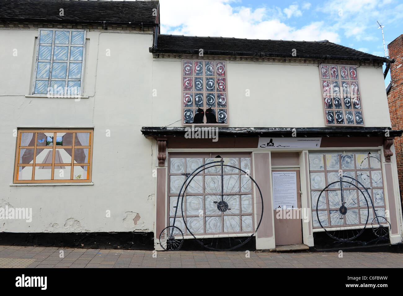 House with painted windows in Market Drayton, Shropshire, England, Uk Stock Photo