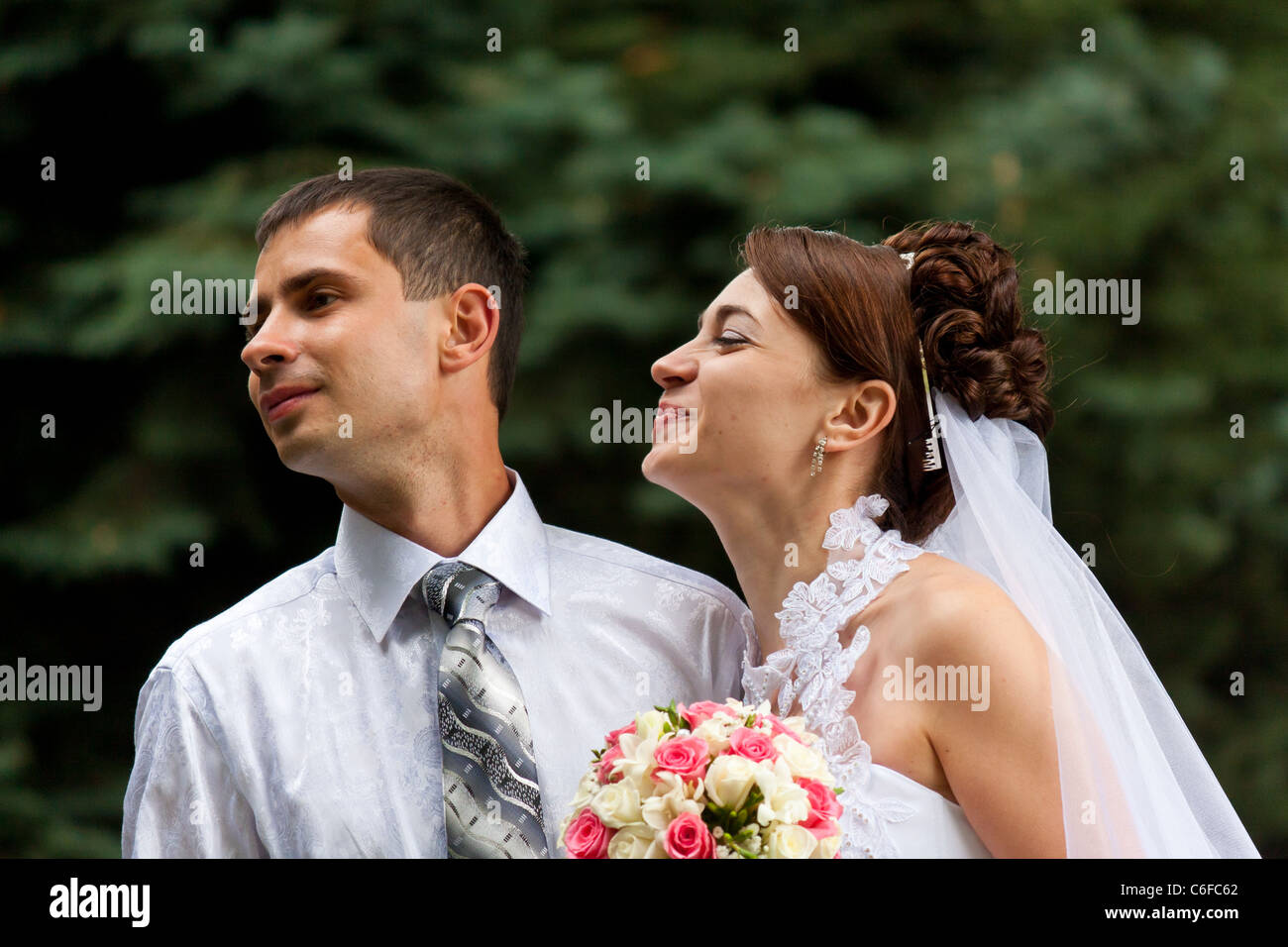 Happy smiling bride and groom Stock Photo - Alamy