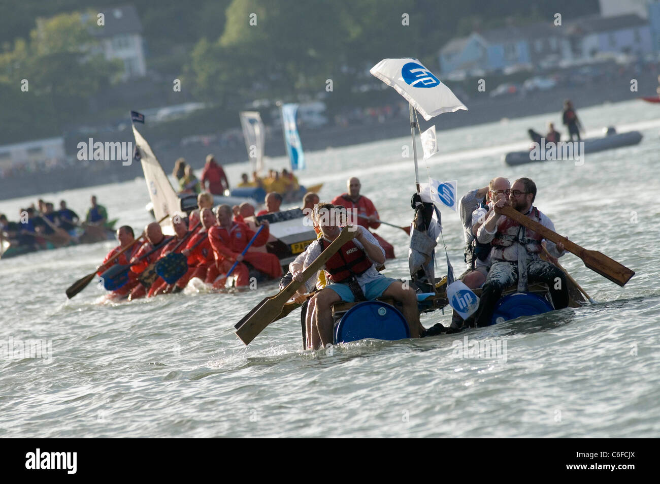 The annual Mumbles Raft Race in Swansea Bay which is held to help raise funds for the RNLI. Stock Photo