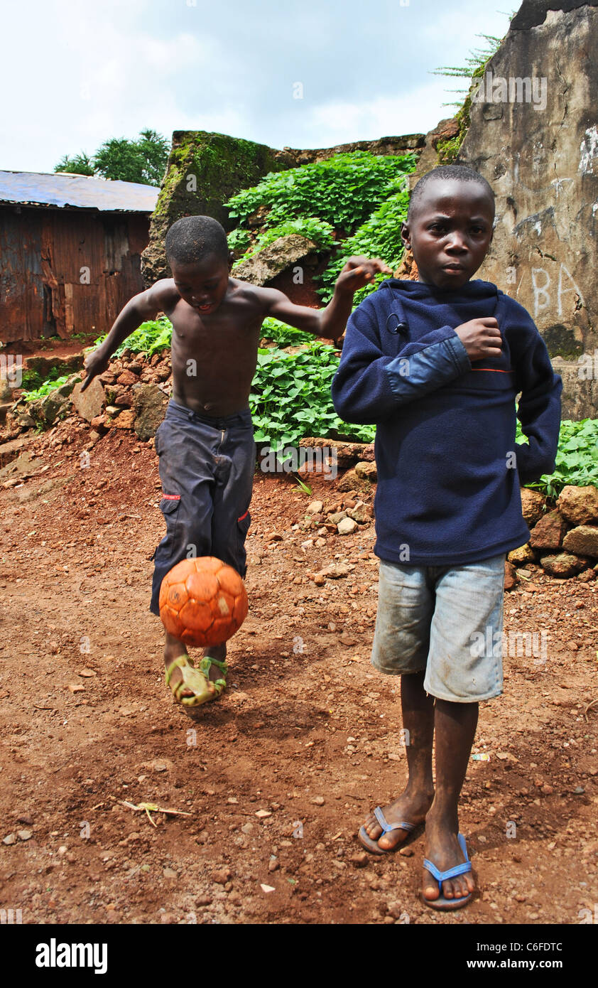 Children play football in a poor area of Freetown, Sierra Leone, West Africa Stock Photo Alamy