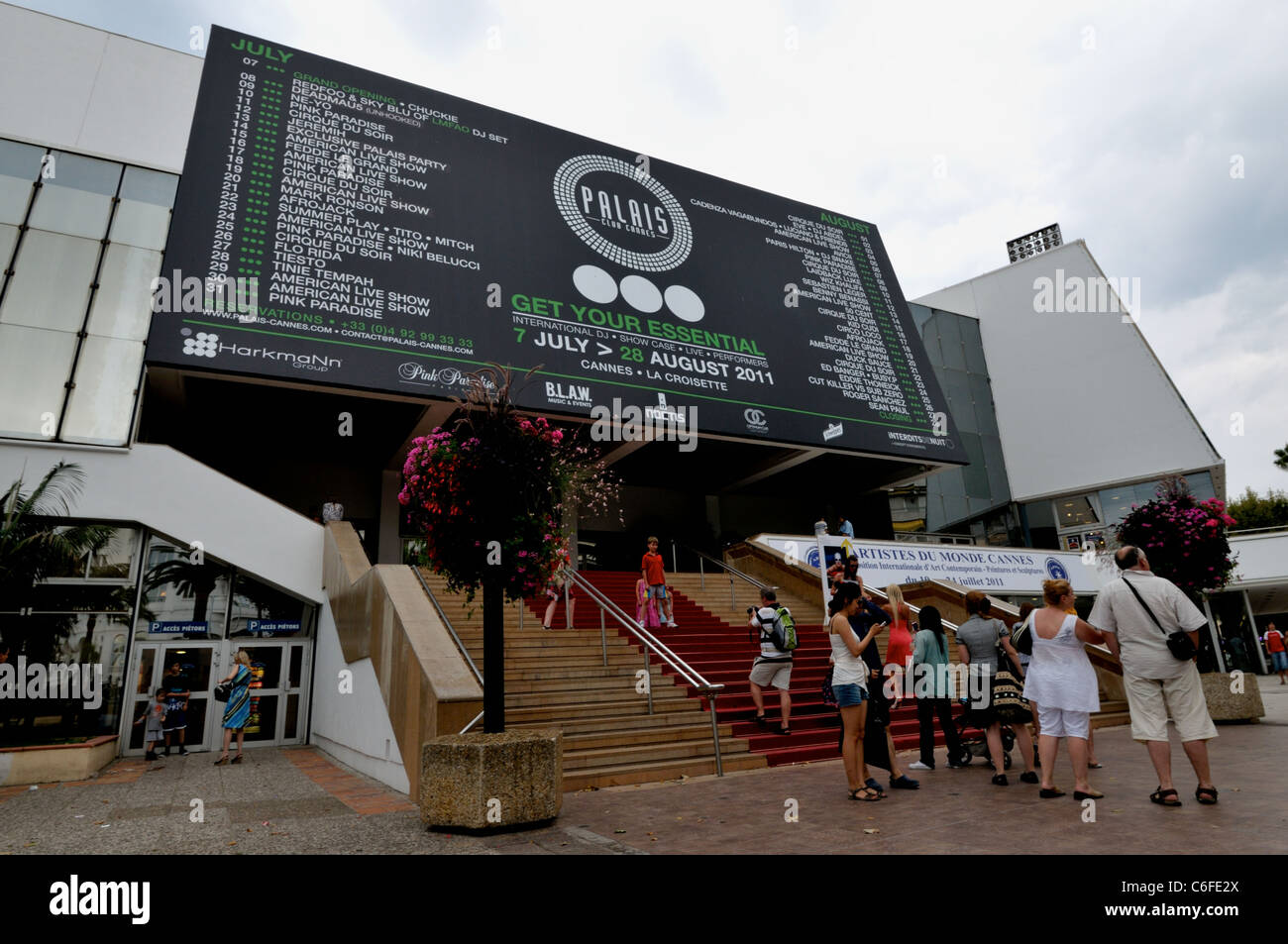 Cannes film festival theater -palais,  French Riviera -tourist and holiday makers taking pictures and visiting famous place. Stock Photo