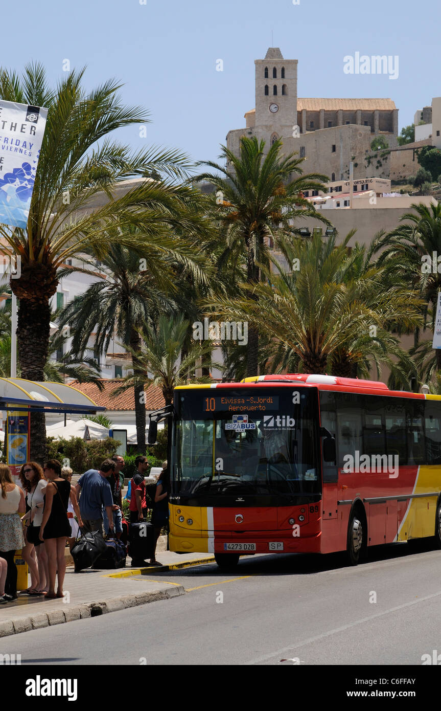 Passengers boarding the airport bus service in Eivissa town centre on Ibiza a Spanish holiday Island Stock Photo