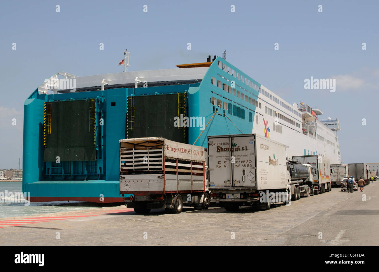 Trucks wait to board the roro ferry Abel Matutes in the port of Eivissa in Ibiza a Spanish Island Stock Photo