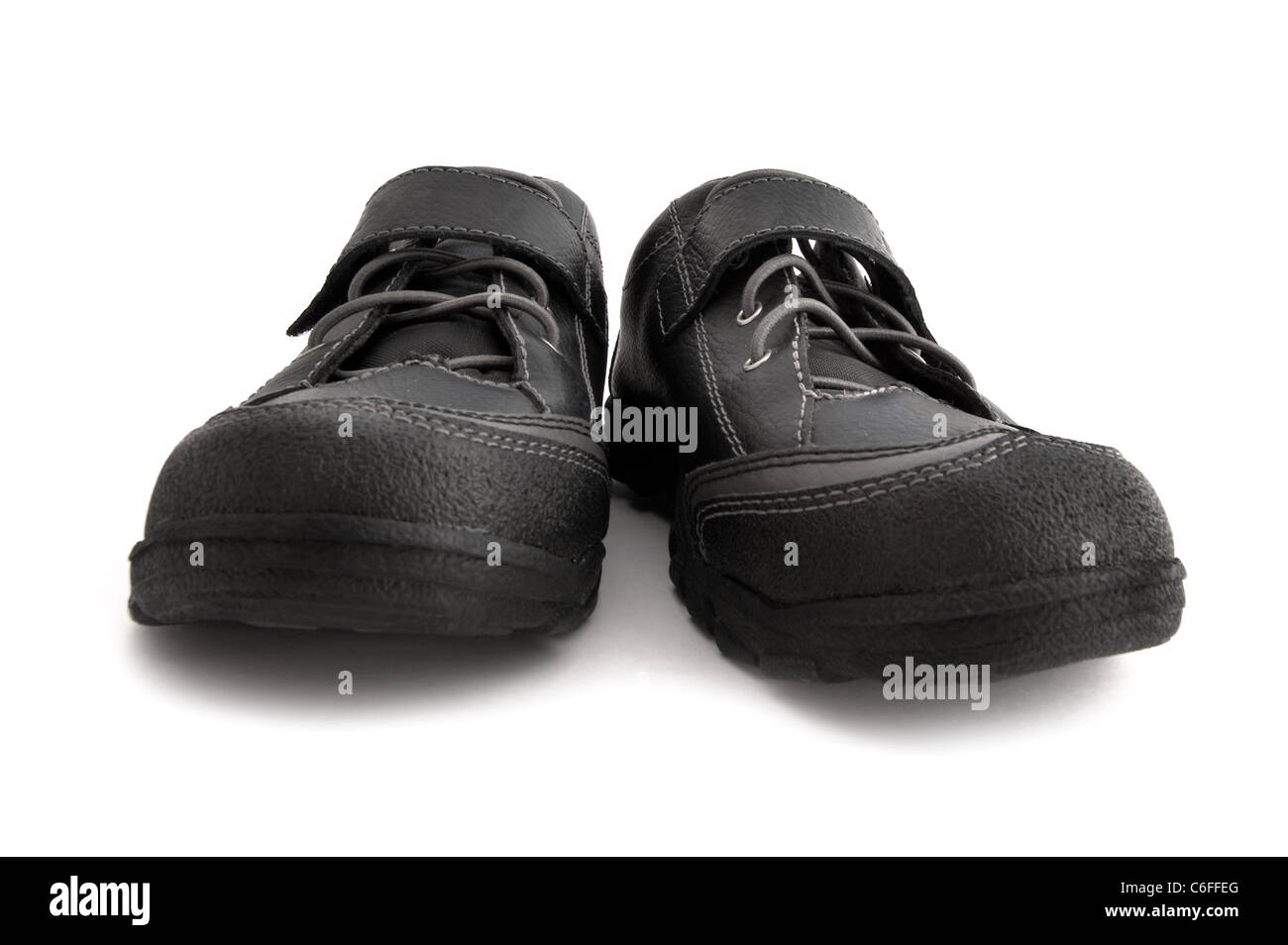 object on white - black shoe close up Stock Photo - Alamy