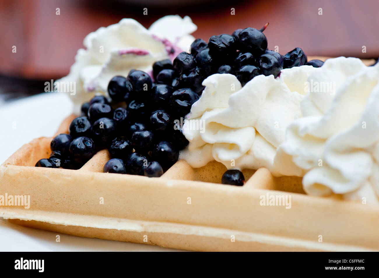 Waffle with blueberry topping, Poland Stock Photo Alamy