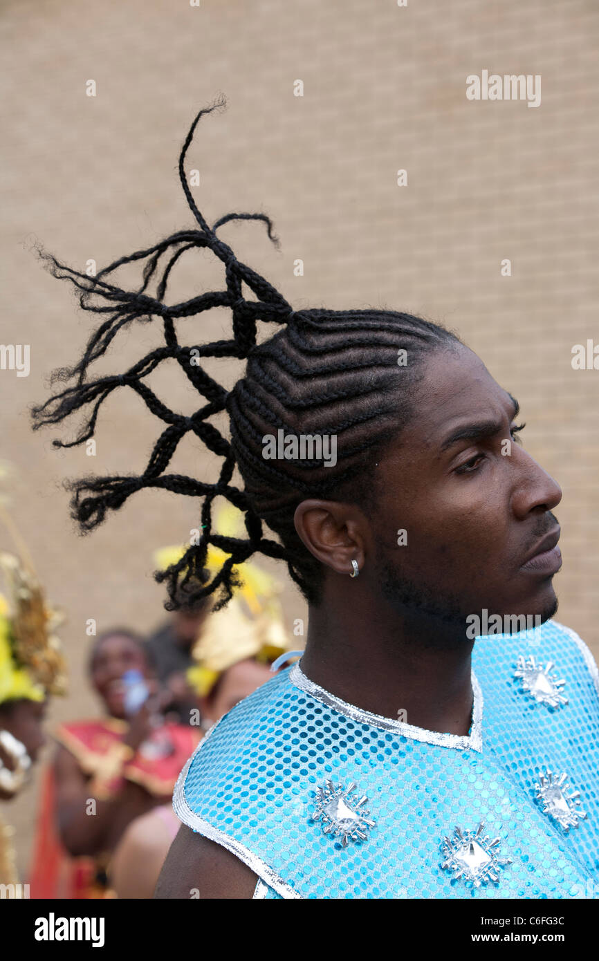 Distinctive hair style at Notting Hill Carnival Stock Photo Alamy