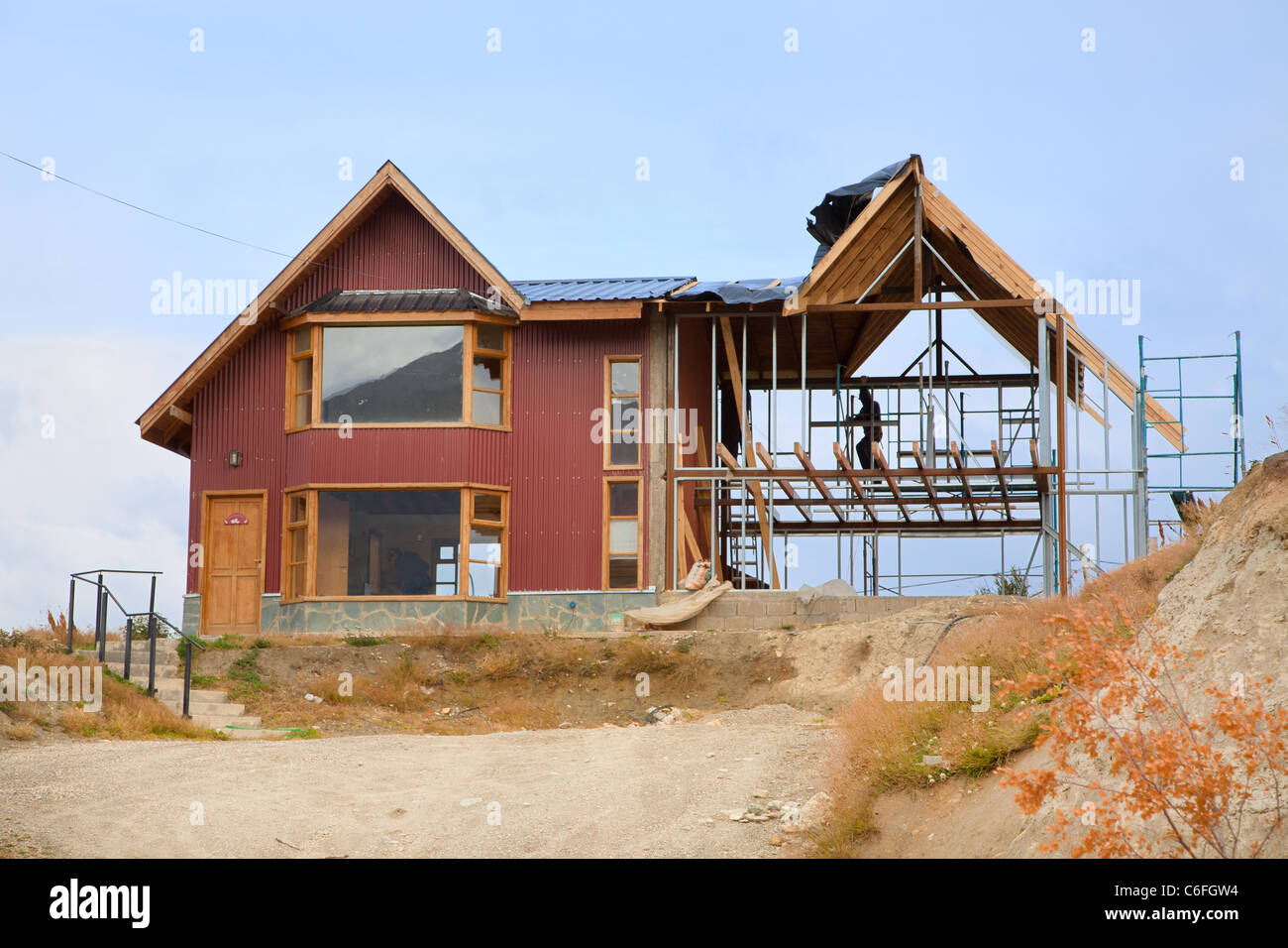 Building a house in Argentina with scaffolding Stock Photo Alamy