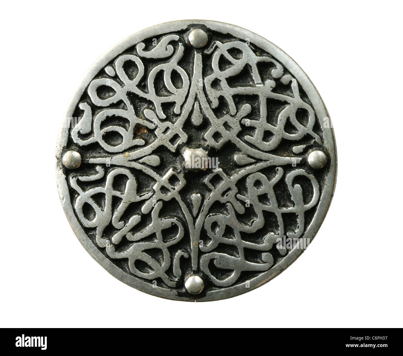 pewter celtic brooch pin isolated on white Stock Photo