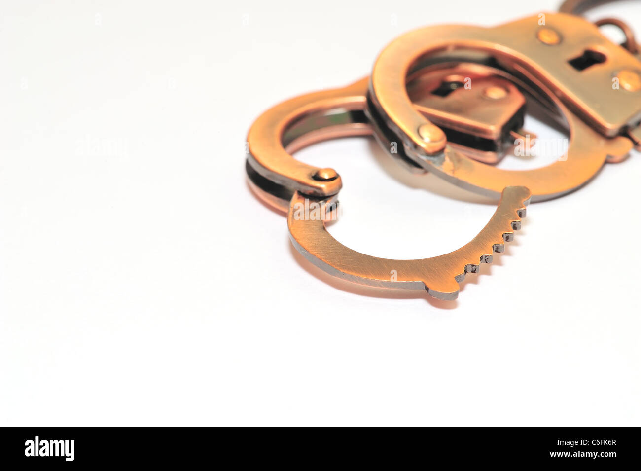 A pair of handcuffs uncuffed Stock Photo Alamy
