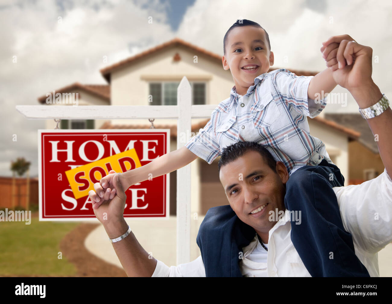 Happy Hispanic Father and Son in Front of New House and Sold Real ...