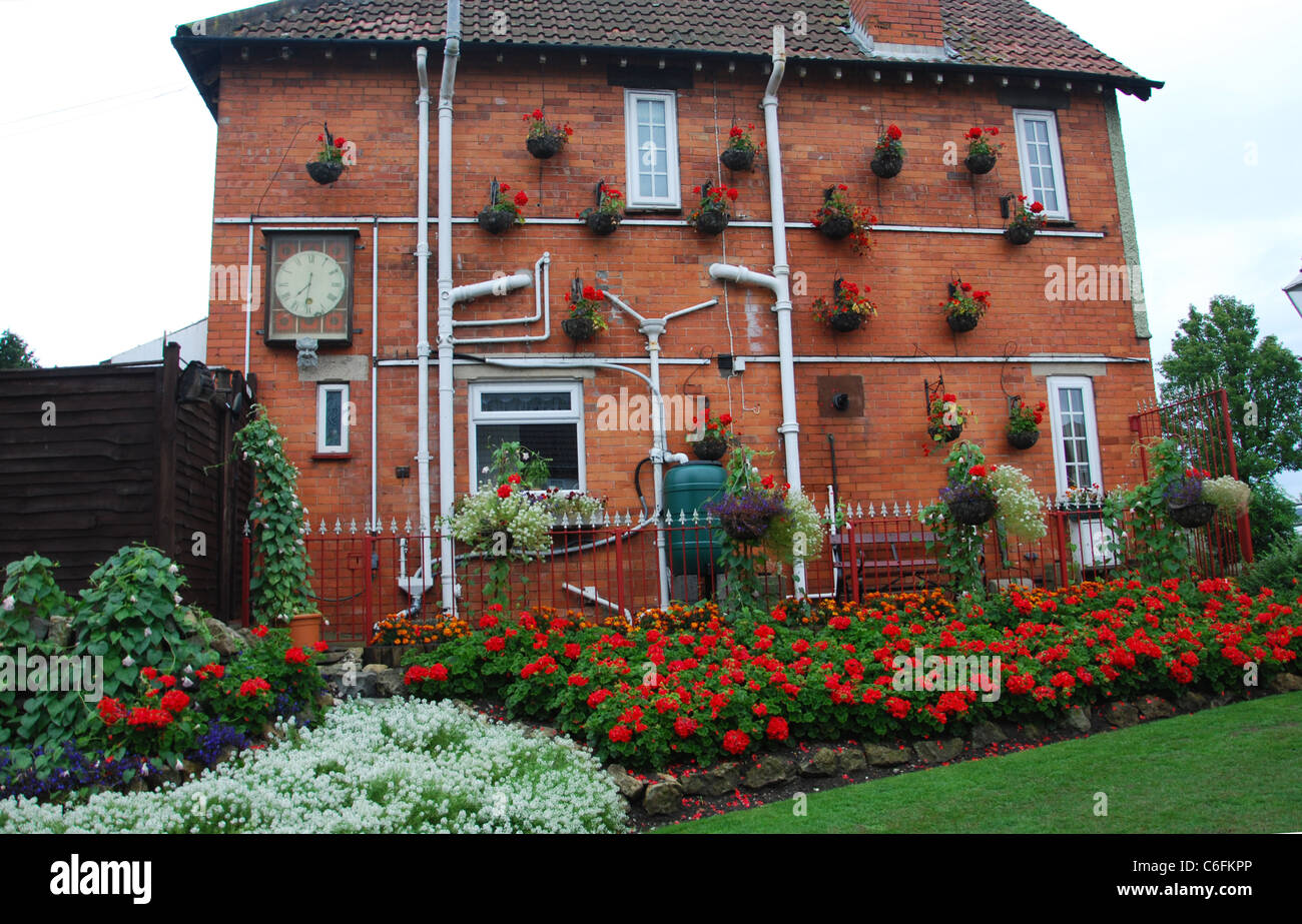 typical house with outside pipework Glastonbury Somerset UK Stock Photo