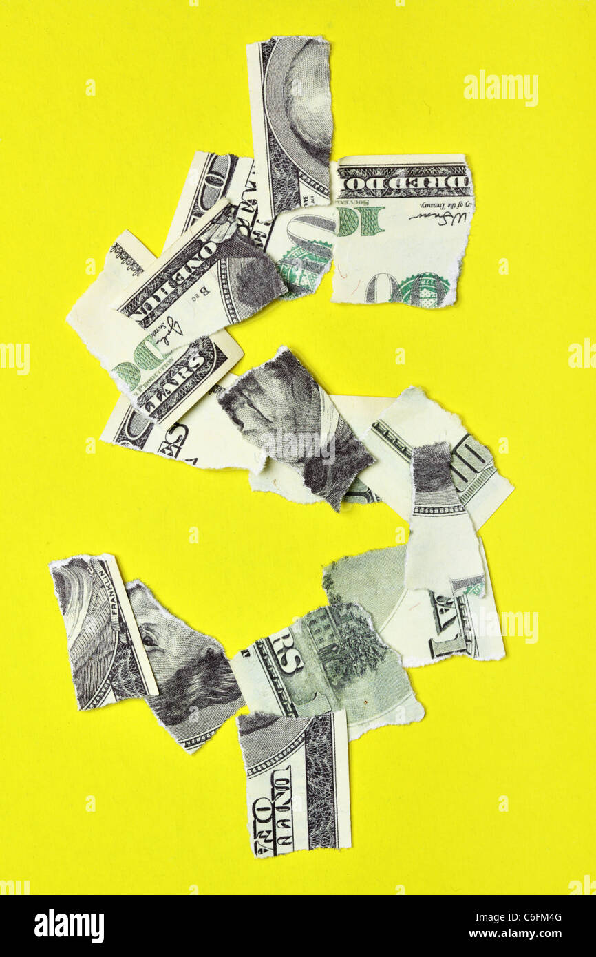Lacerated banknote looking as dollar sign Stock Photo