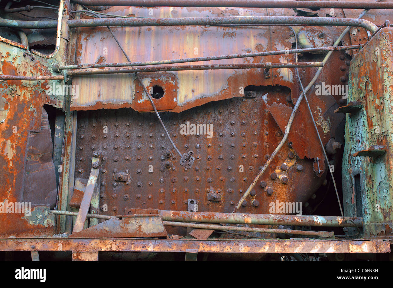 Rusty steam boiler of abandoned steam engine locomotive Stock Photo