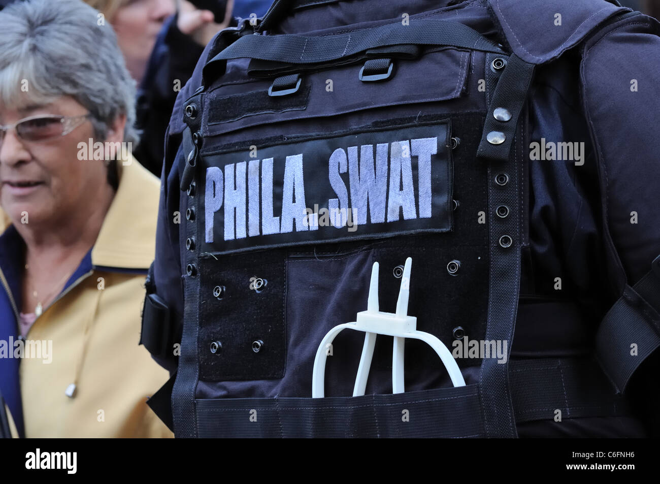 Actor on the World War Z film set in Glasgow wearing a SWAT vest Stock Photo