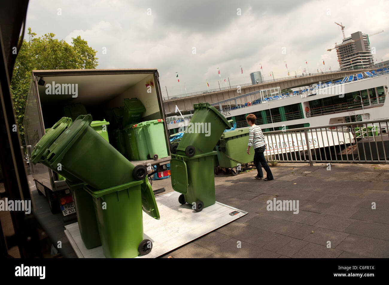 New Wheelie Bins being unloaded Cologne Koln Germany Europe Stock Photo