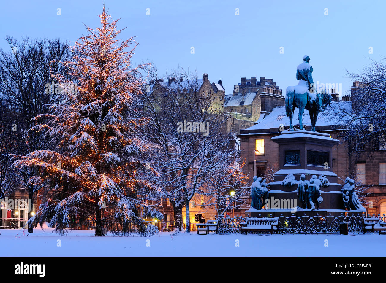Christmas tree and Albert memorial in Charlotte Square with Castle in background, Edinburgh