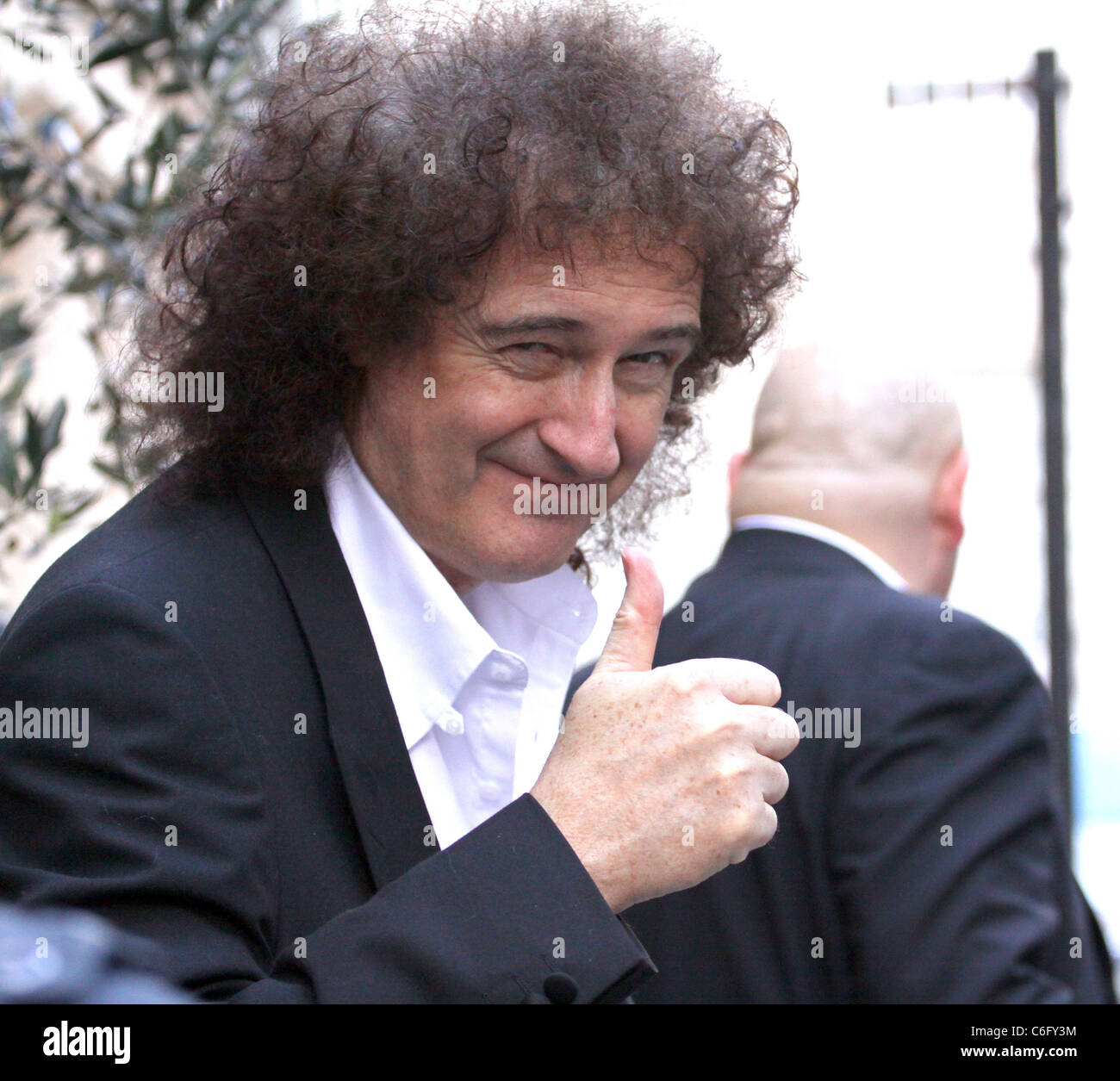 Queen Guitarist Brian May Shows Signs Of Thinning Hair From His