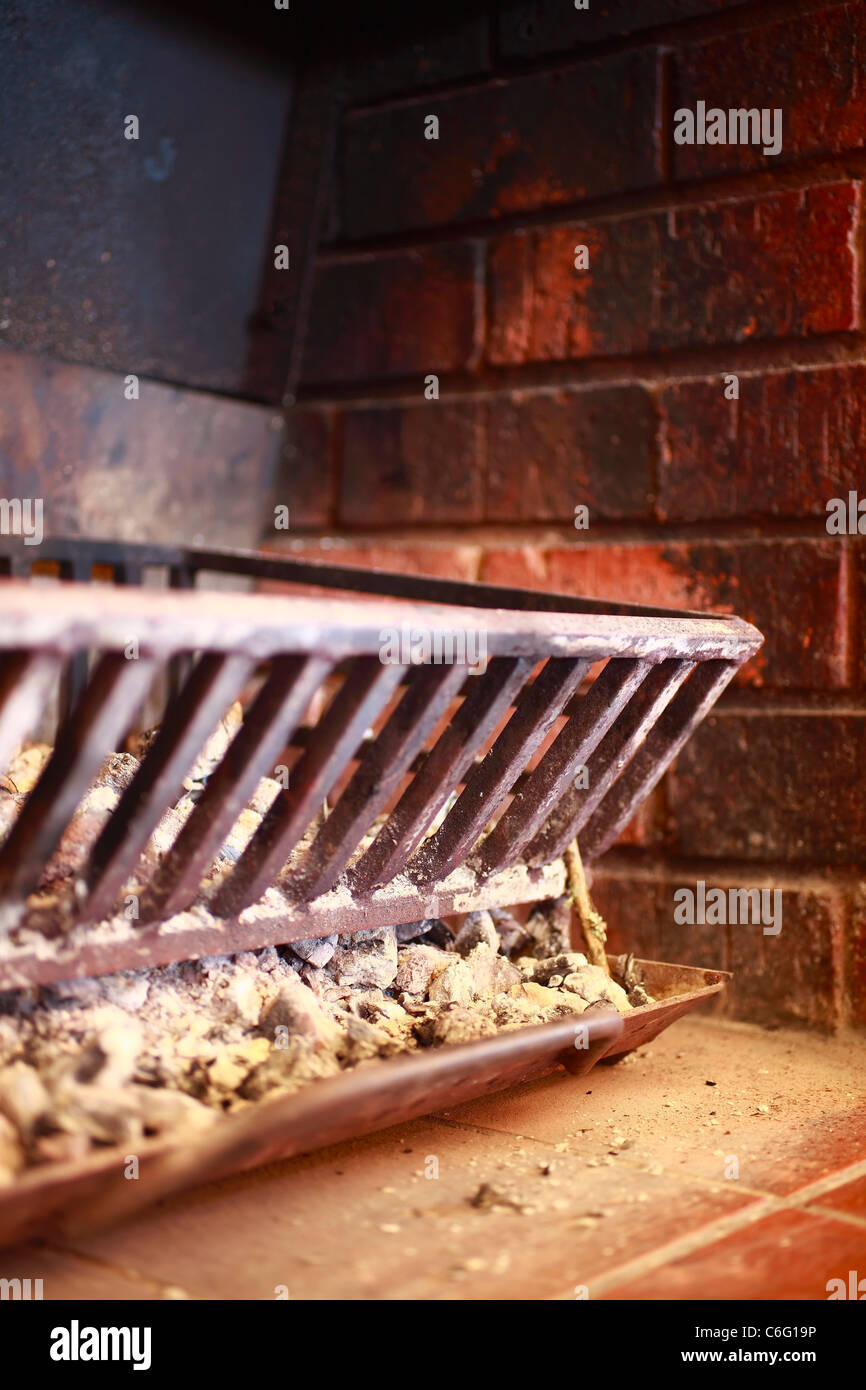 Fireplace A Cast Iron Grate And Coal Tray In A Brick Lined Hearth