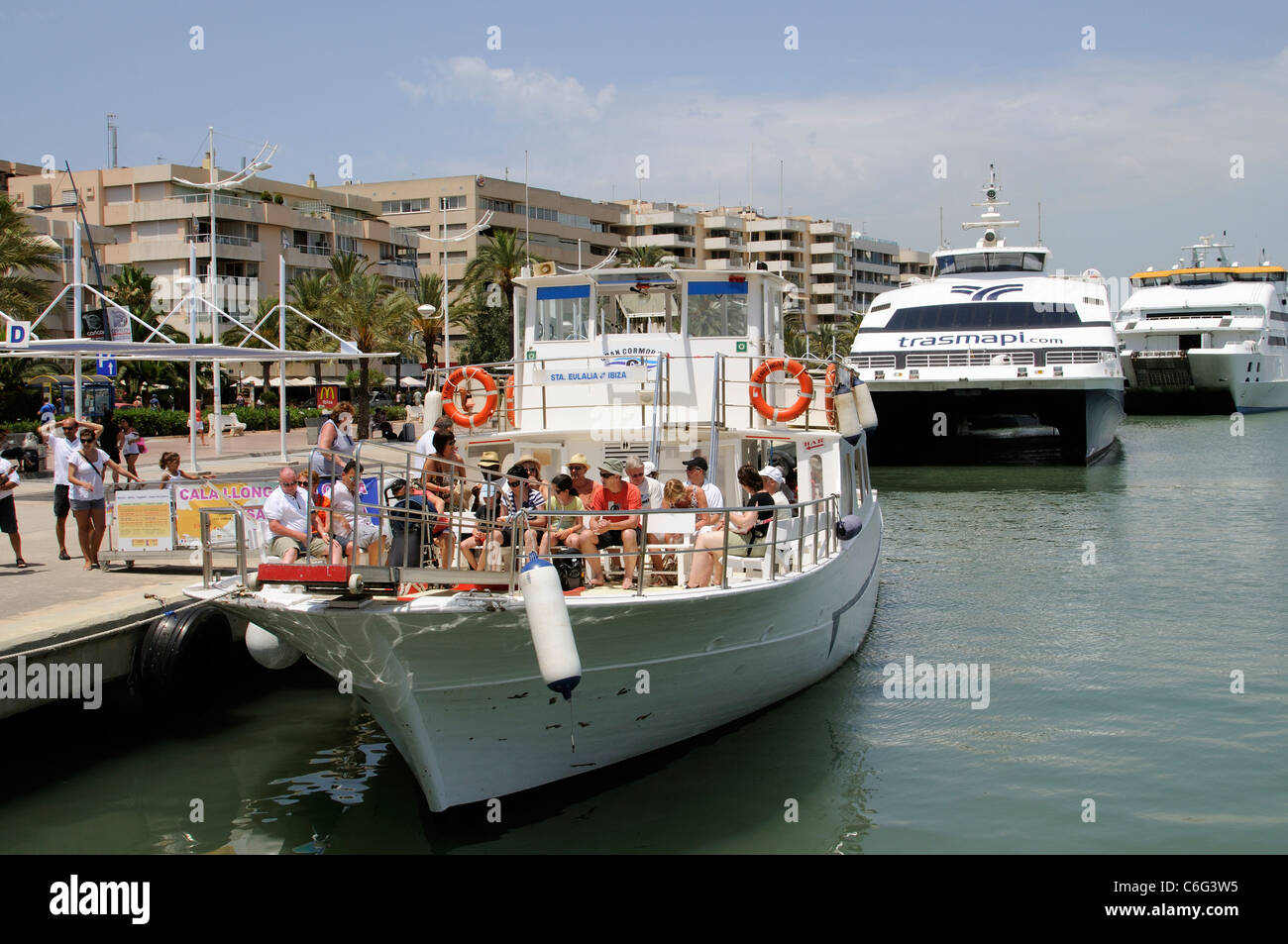 Passenger ferry boarding for a trip to St Eulalia from the quay at Eivissa Ibiza Spanish island Stock Photo