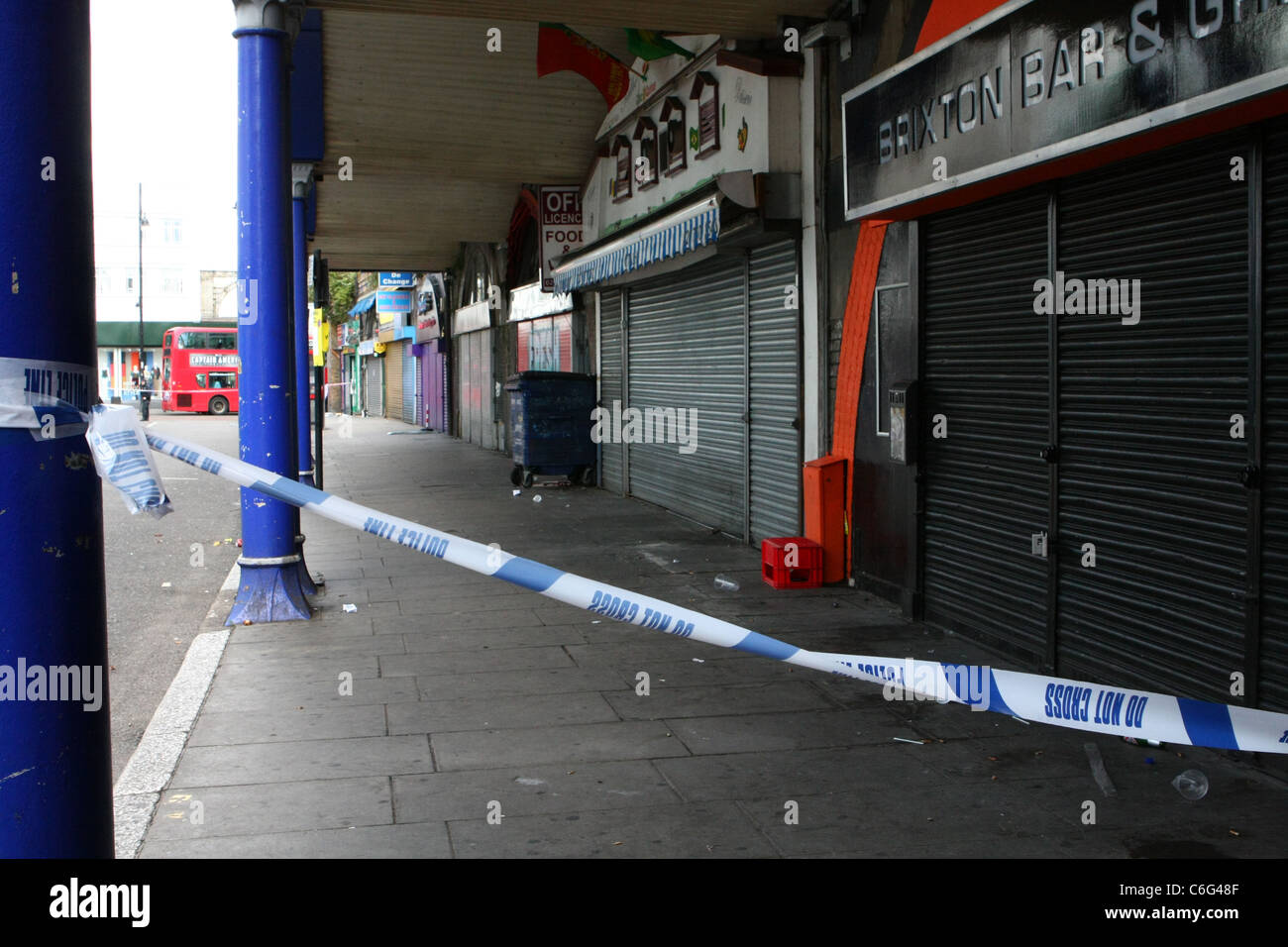 Atlantic Road in Brixton, London, cordoned off after the riots in August  2011 Stock Photo - Alamy