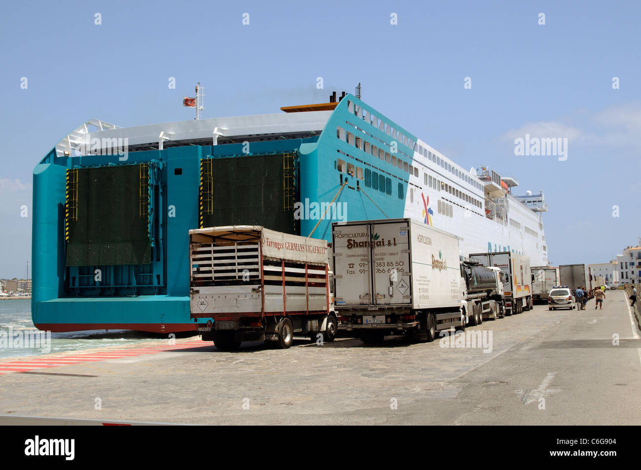 Trucks wait to board the roro ferry Abel Matutes in the port of Eivissa in Ibiza a Spanish Island Stock Photo