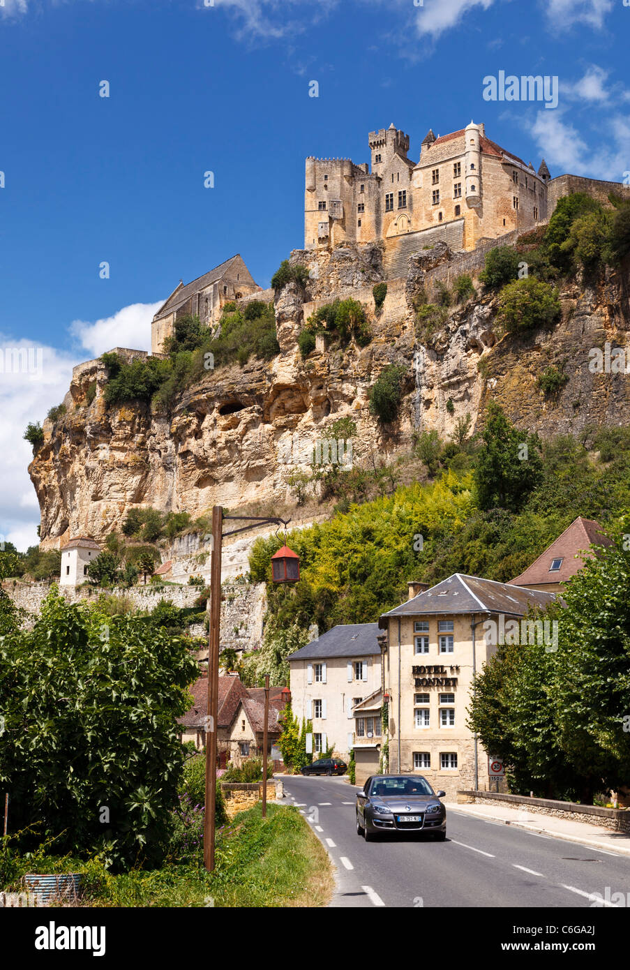 Dordogne, France - Chateau on the cliff at Beynac et Cazenac, Perigord Noir, Dordogne, France, Europe with car driving Stock Photo