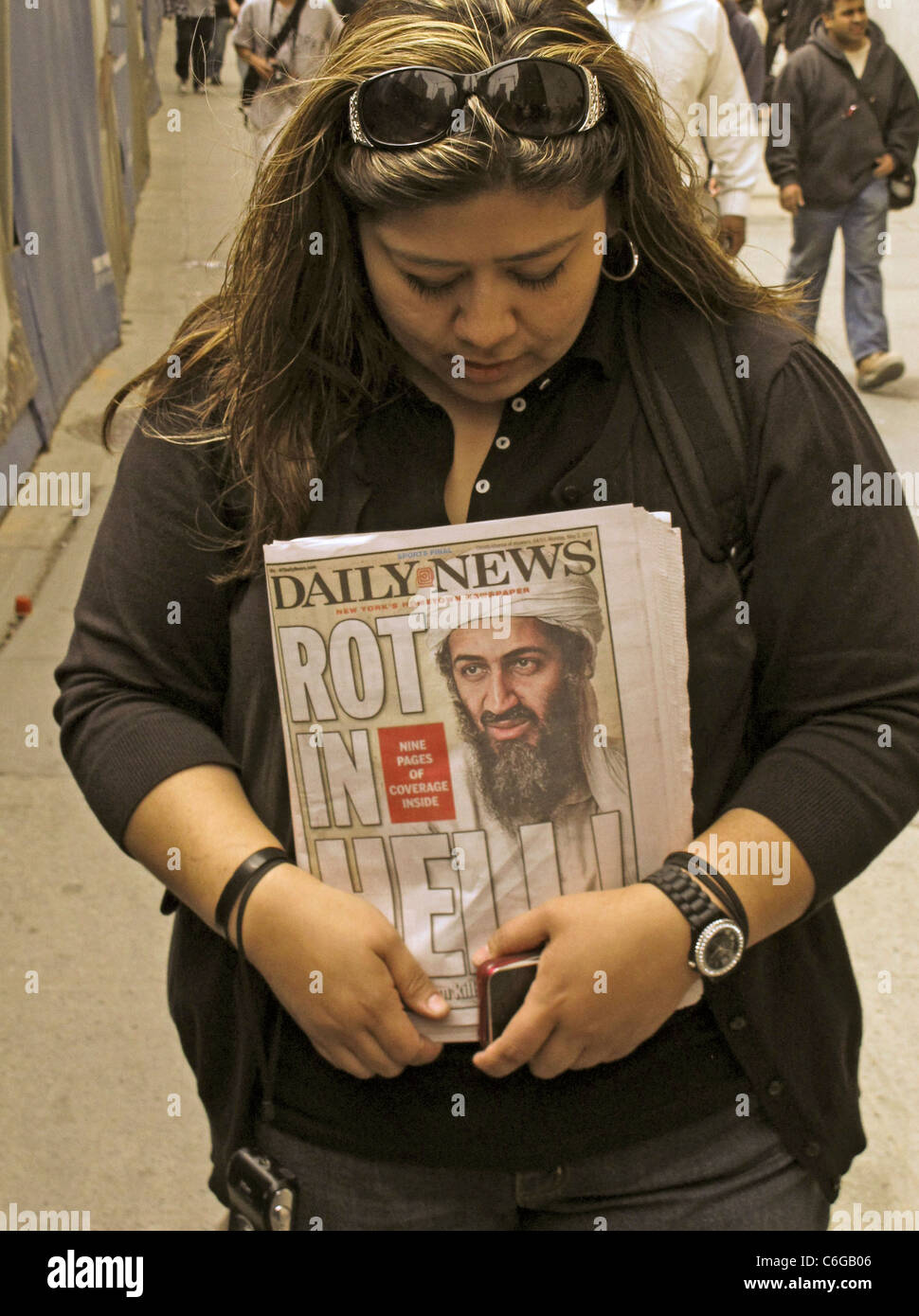 Women Holding New York Post,killing Bin Laden Stock Photo