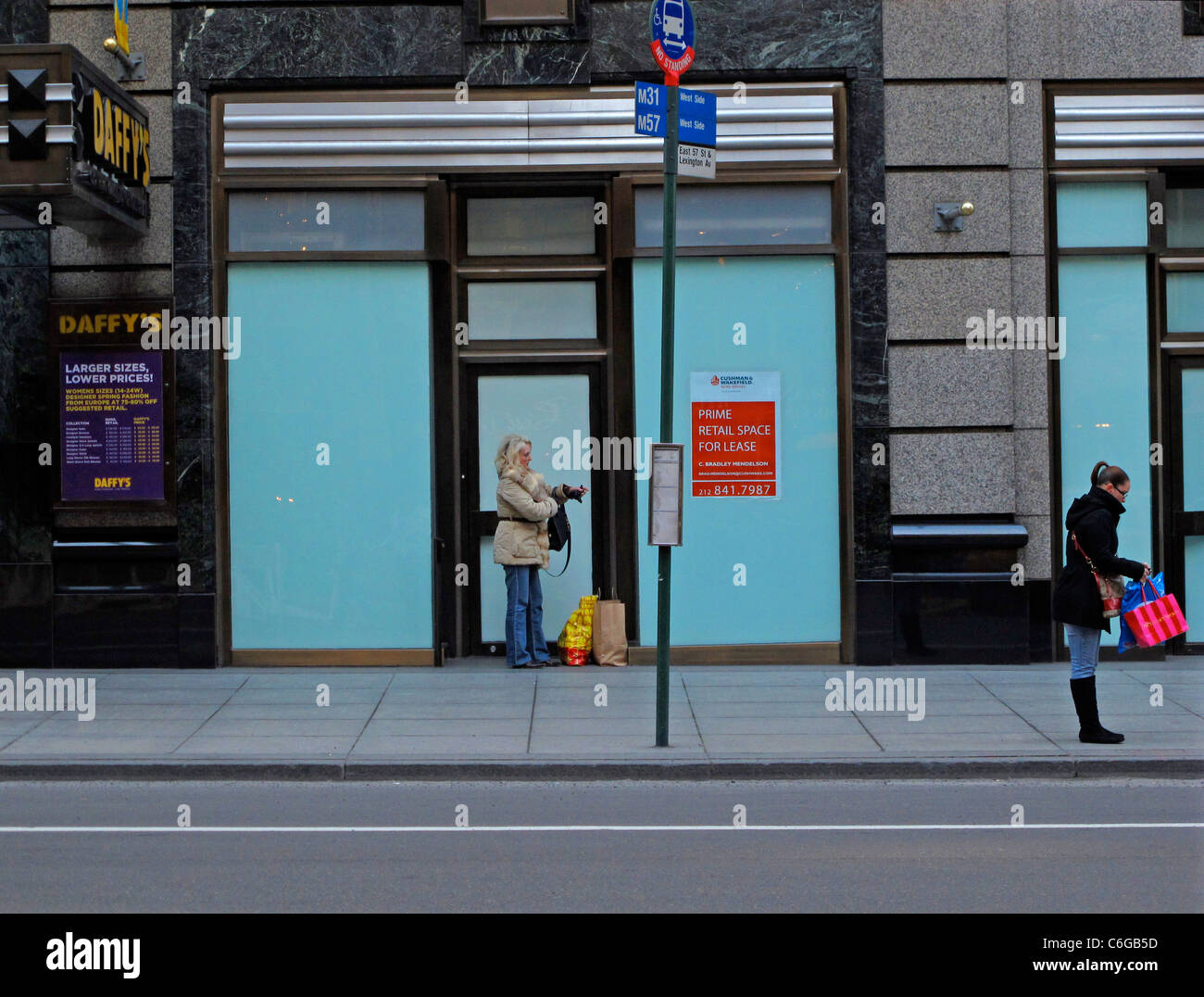 Shoppers on East 57th Street NYC Stock Photo