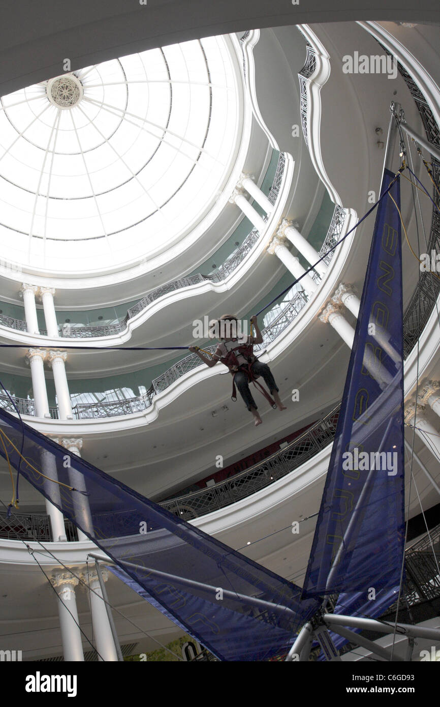 Bungee jumping inside Whiteley's of Queensway in London Stock Photo Alamy