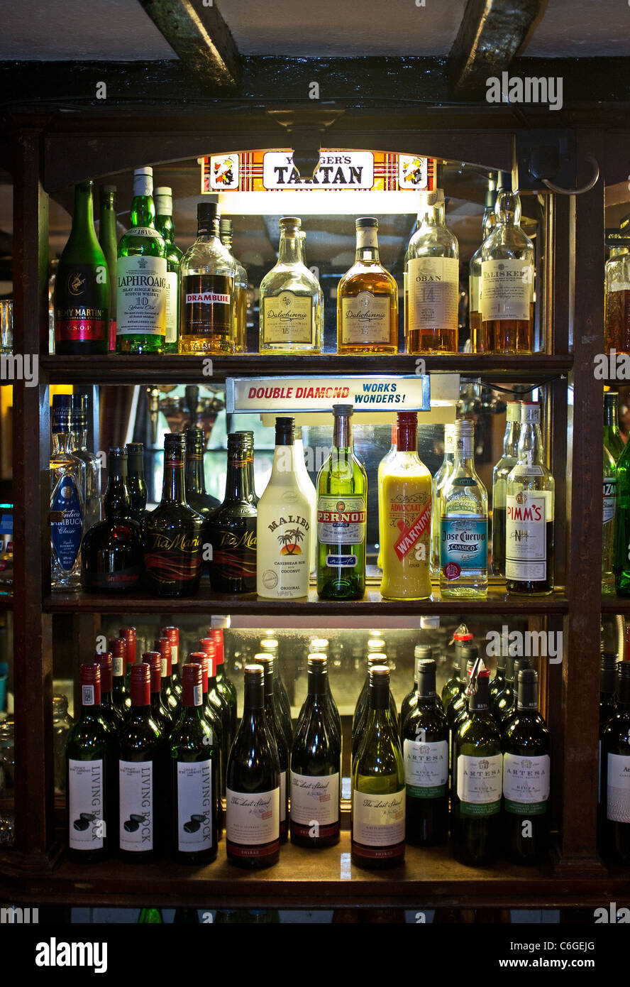 Shelves full of bottles of alcohol inside a pub Stock Photo Alamy