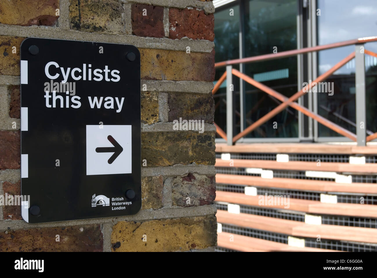 cyclists this way sign with right pointing arrow, at brentford lock, west london, england Stock Photo
