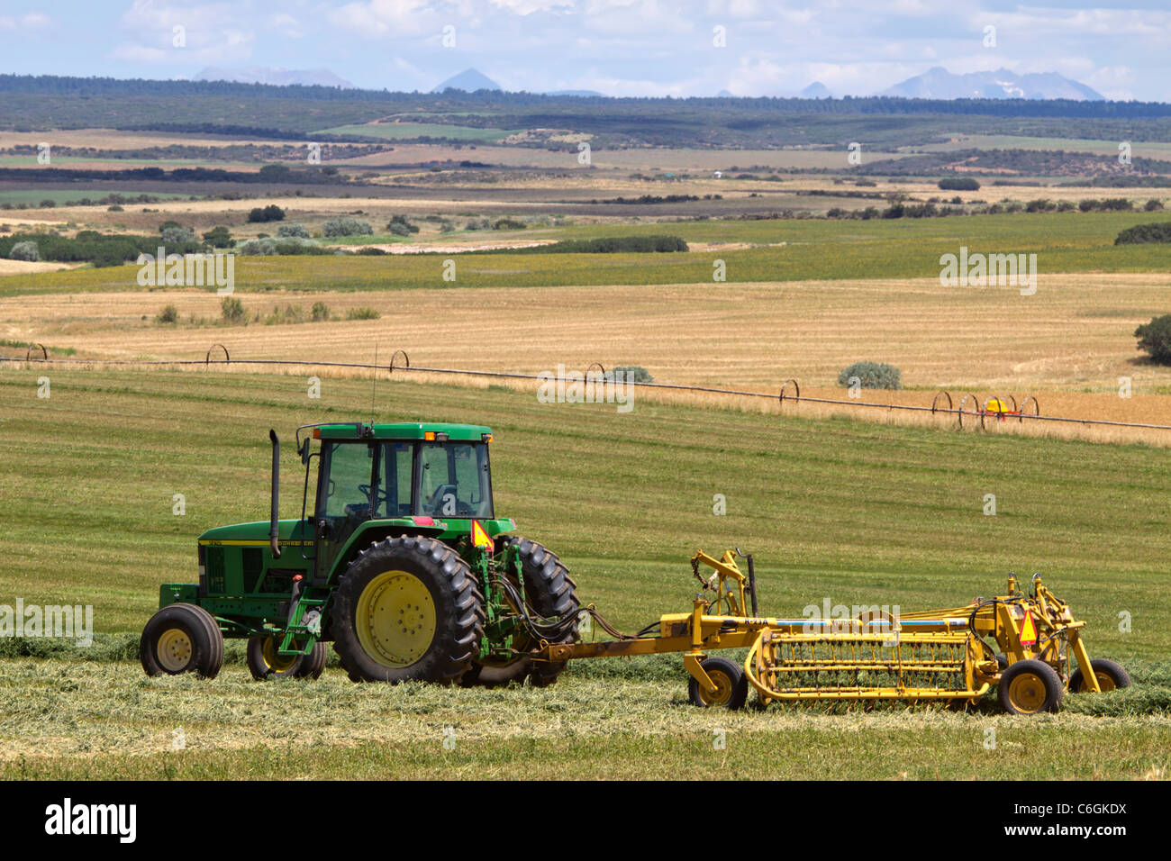 Tractor in field near Cortez, Colorado Stock Photo Alamy