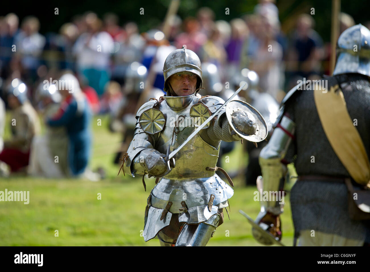 Medieval battle re-enactment at Herstmonceux Castle in Sussex UK Stock ...