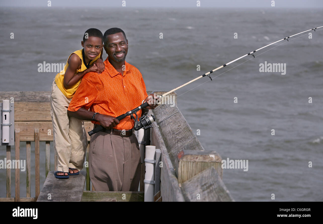 African american father son fishing off hi-res stock photography and images  - Alamy