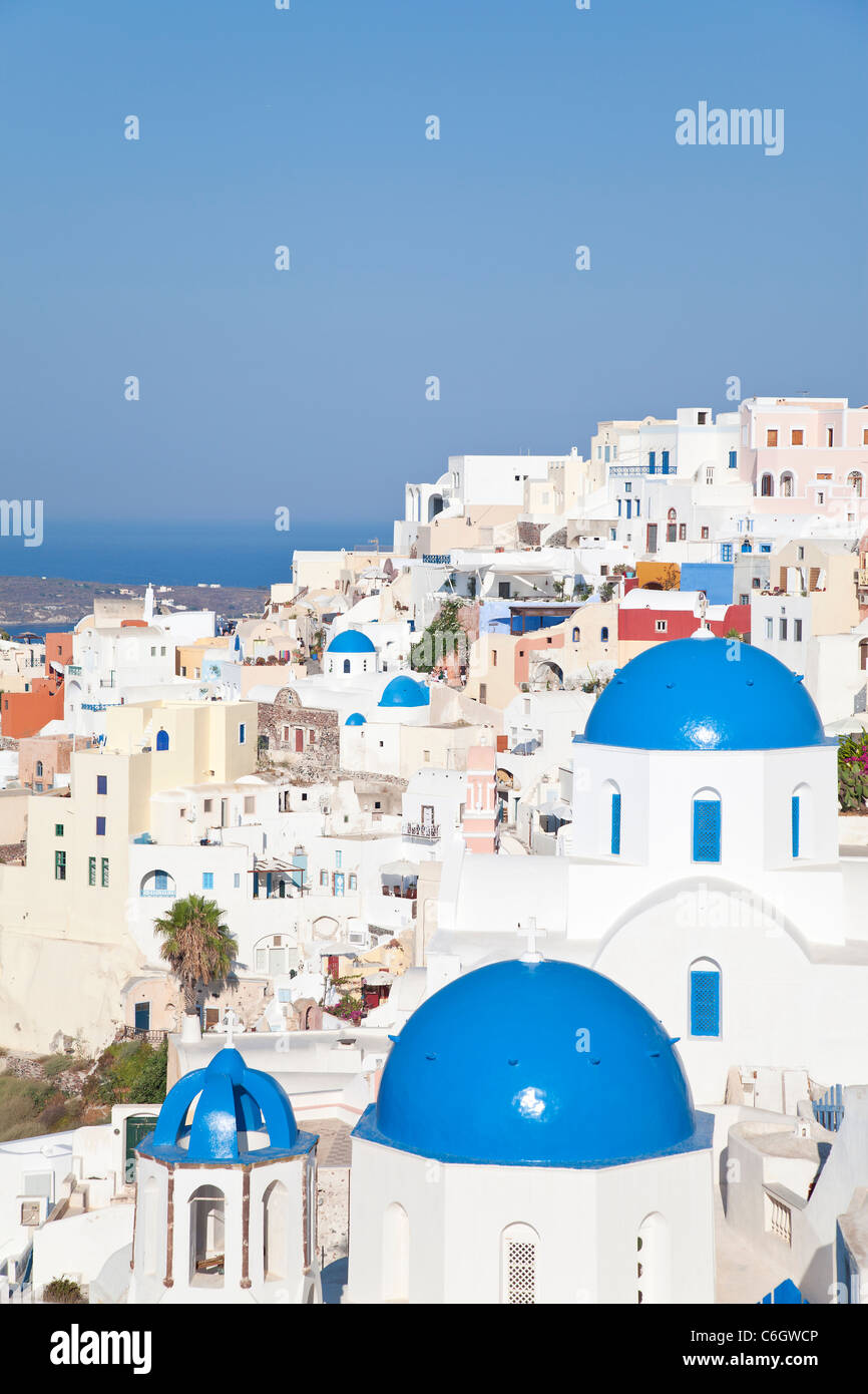 Blue domed churches in the village of Oia (La), Santorini (Thira), Cyclades Islands, Aegean Sea, Greece, Europe Stock Photo