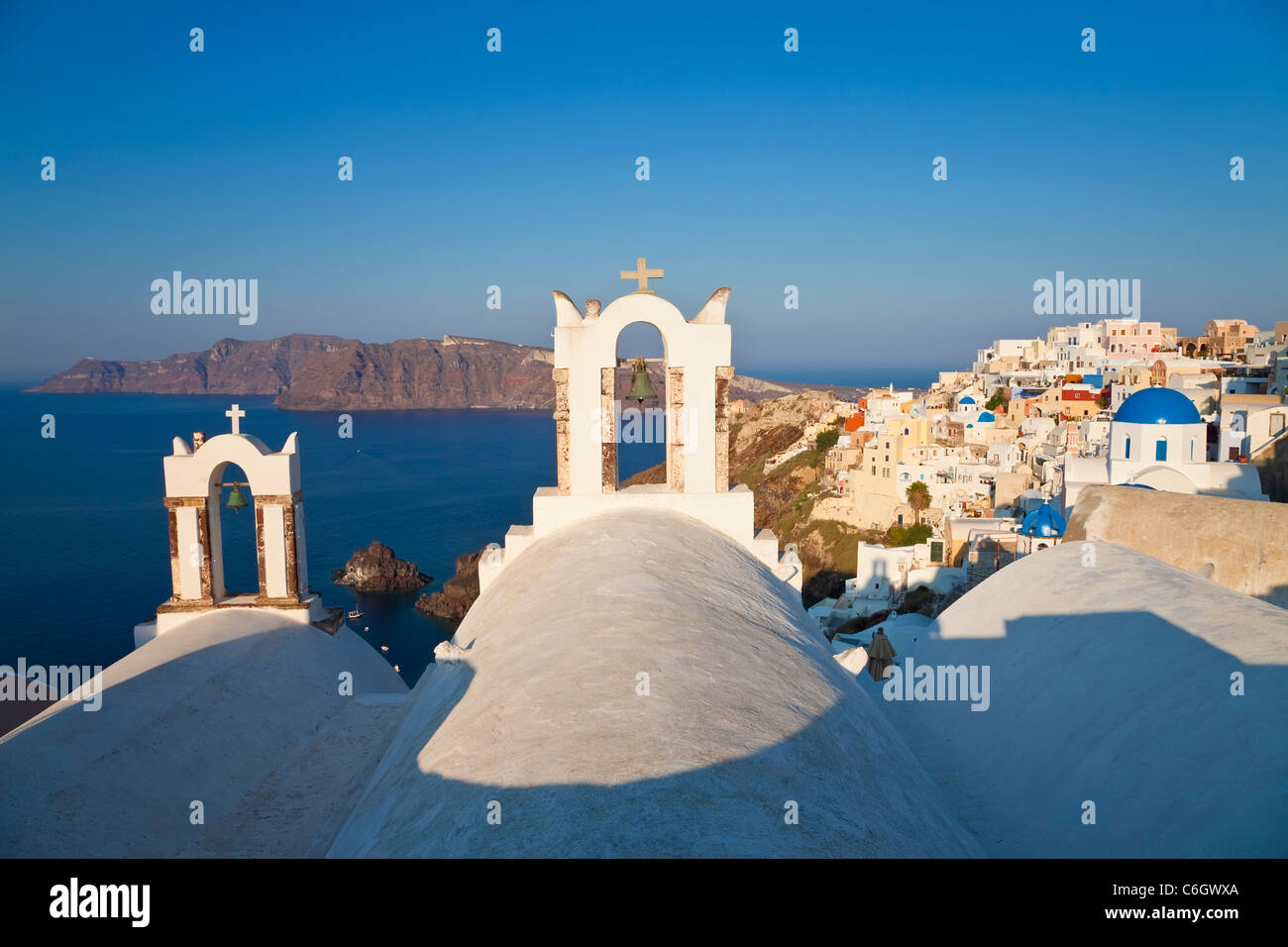 The blue domed churches of Oia, Santorini, Cyclades, Greece Stock Photo