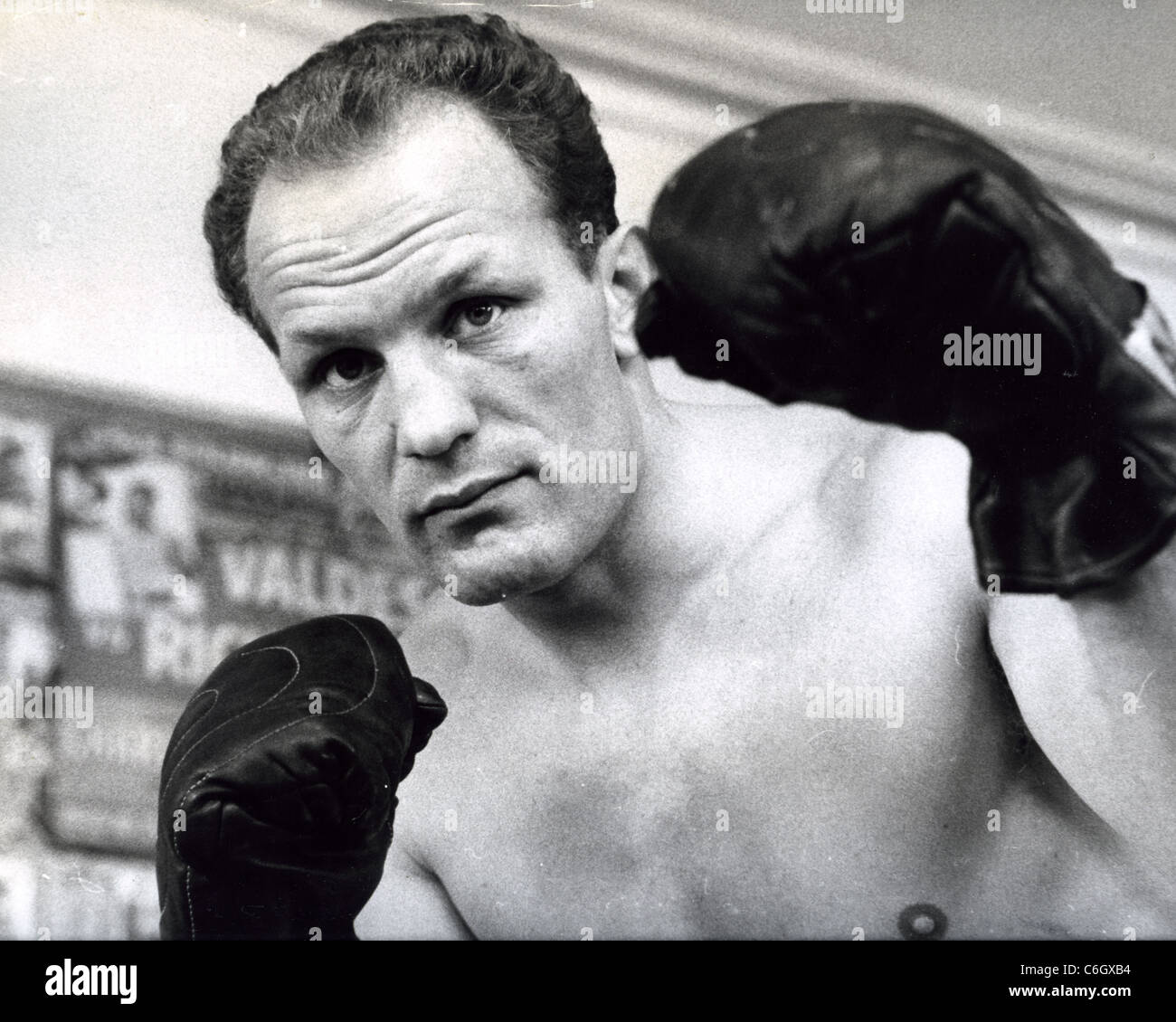 HENRY COOPER (1934-2011) English heavyweight boxer in 1961 Stock Photo