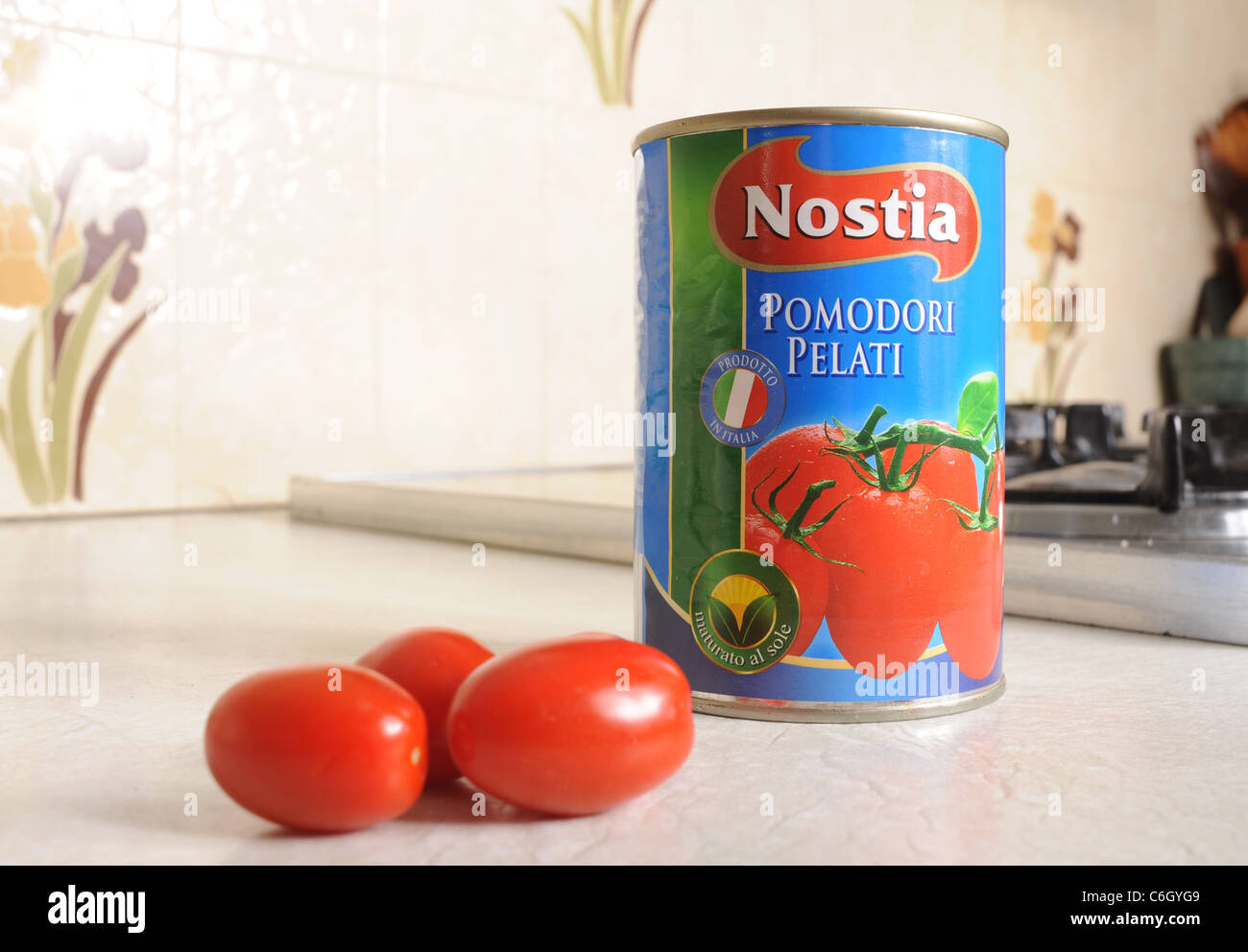 Can of Nostia plum tomatoes in kitchen uk Stock Photo