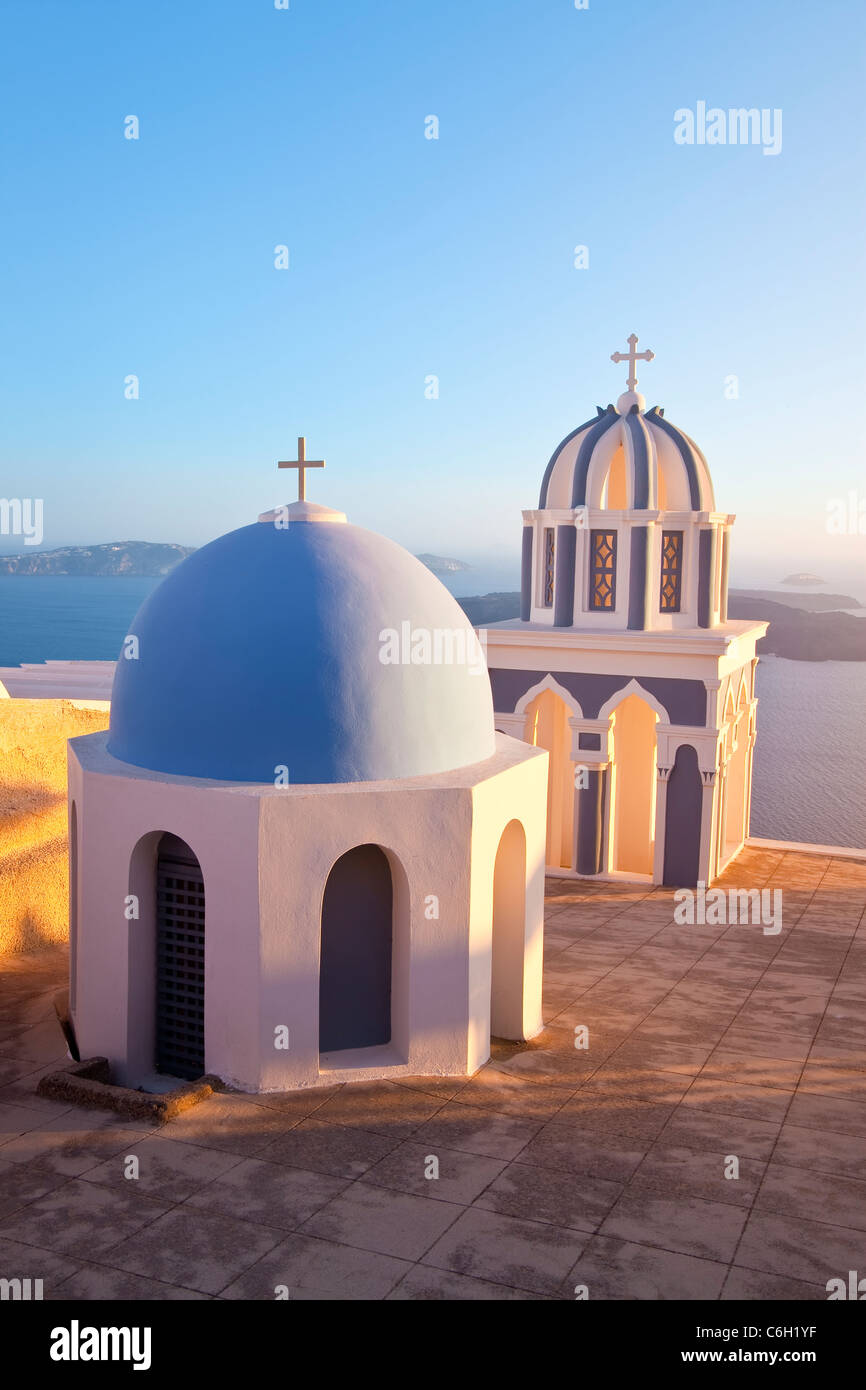 Bell Towers of Orthodox Church overlooking the Caldera in Fira, Santorini (Thira), Cyclades Islands, Aegean Sea, Greece, Europe Stock Photo