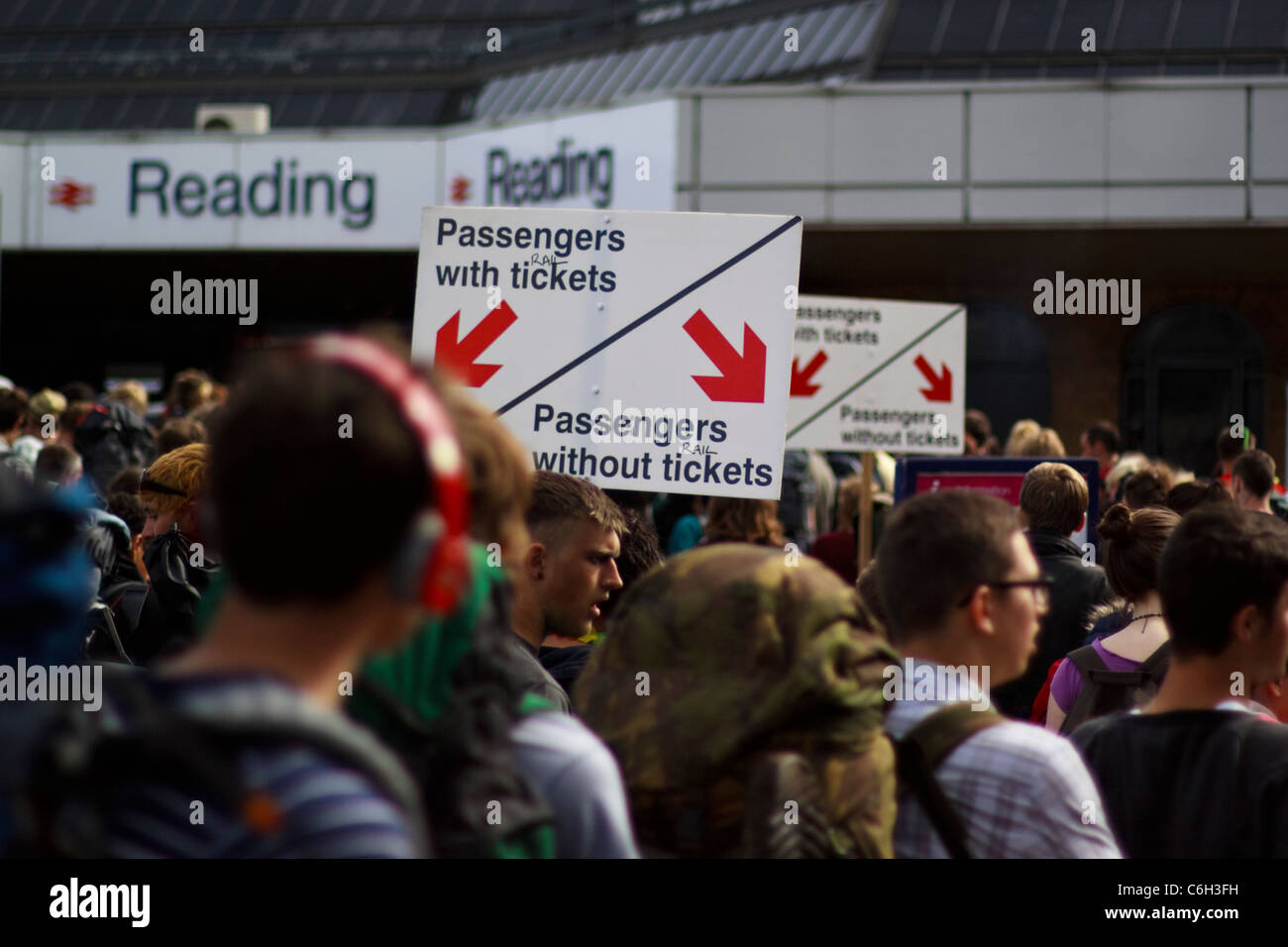 Thousands of people head home after Reading Festival 2011, queues of several hours just to get into the station are common! Stock Photo