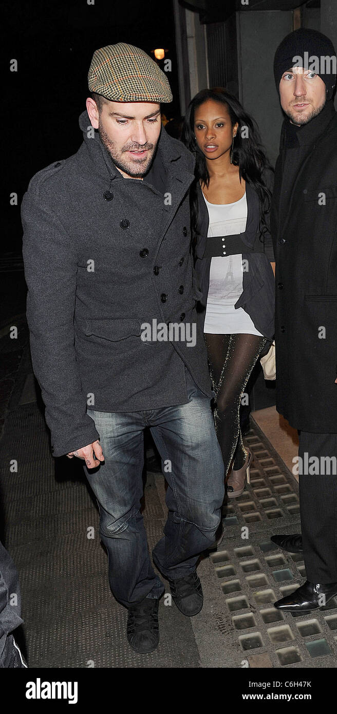 Shane Lynch of 'Boyzone' leaves the Ivy restaurant and night club with his wife Sheena White, where they enjoyed an evening out Stock Photo