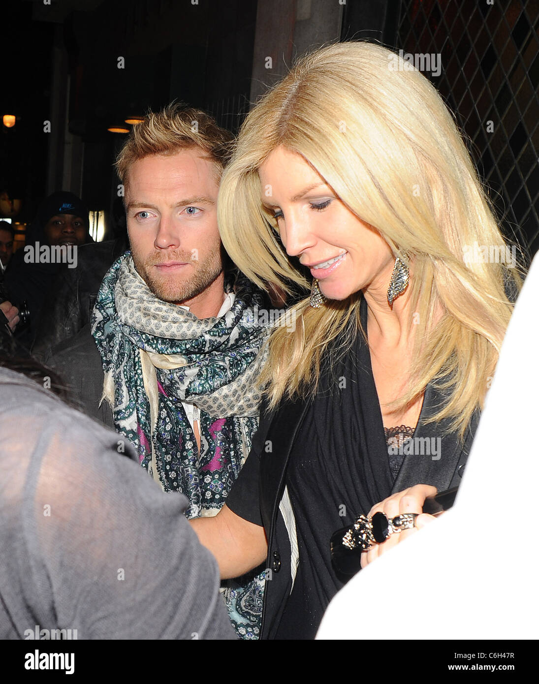 Ronan Keating of 'Boyzone' leaves the Ivy restaurant and night club with his wife Yvonne Connolly, where they enjoyed an Stock Photo